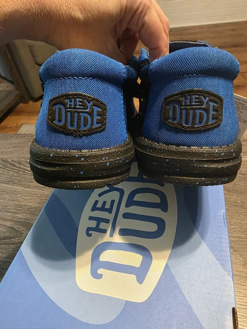 Hey Dude Men's Blue Casual Moccasin Shoes With Black Soles And Logo.